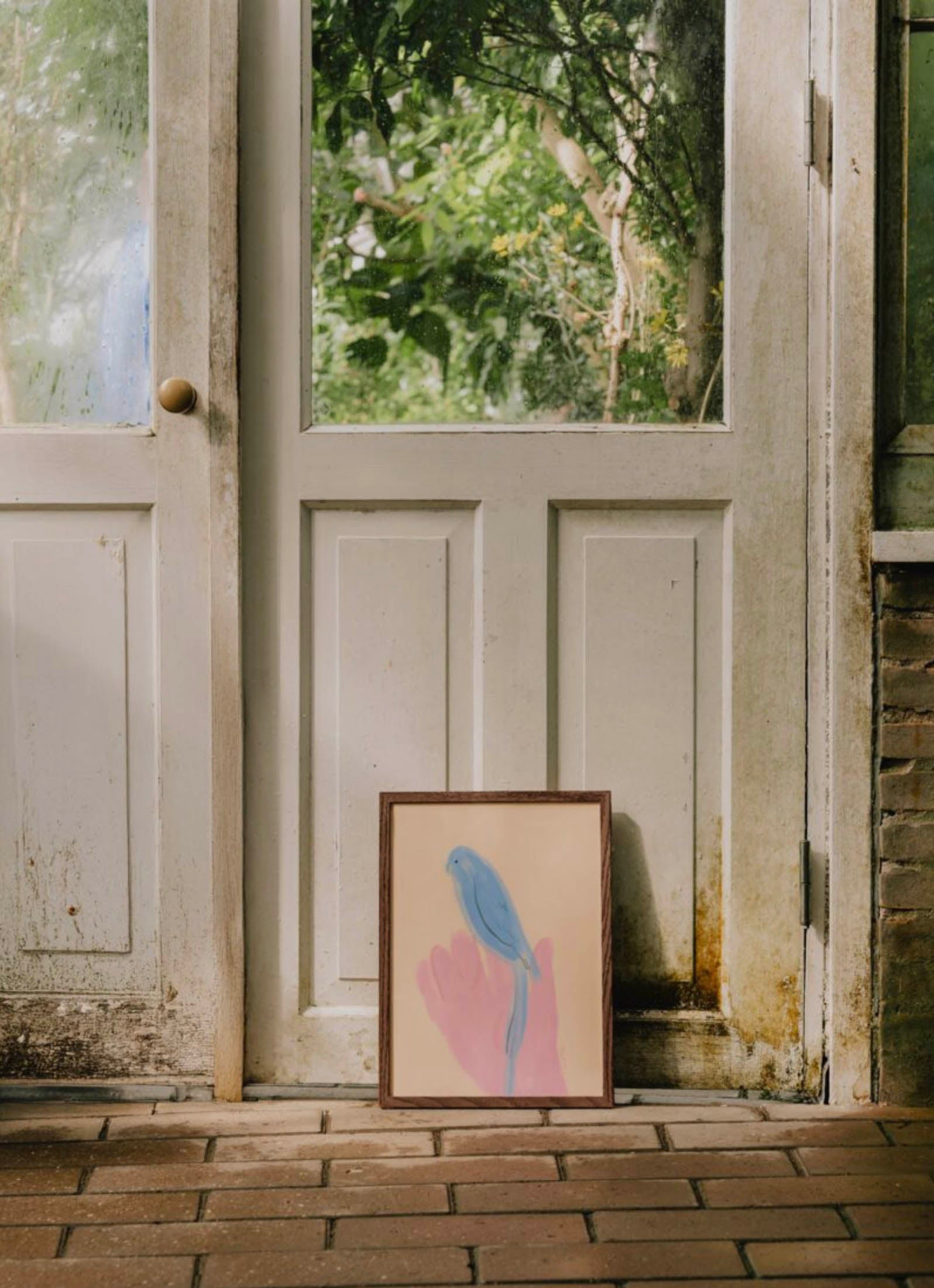 The Poster Club Oamul - Parrot in Hand